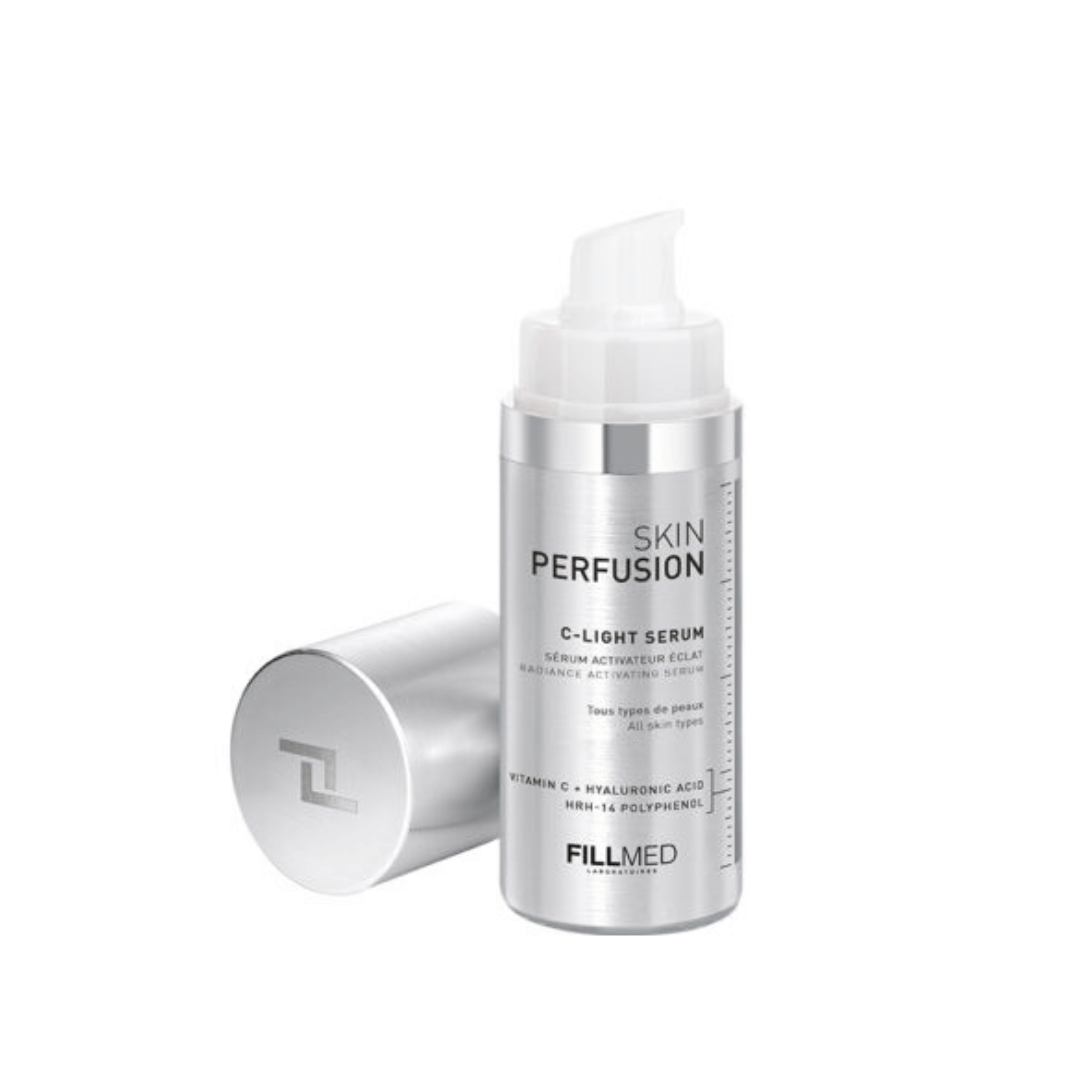 Fillmed Skin Perfusion C-Light Serum 30ml bottle with cap off and placed beside, serum with Vitamin C and antioxidants for skin maintenance.