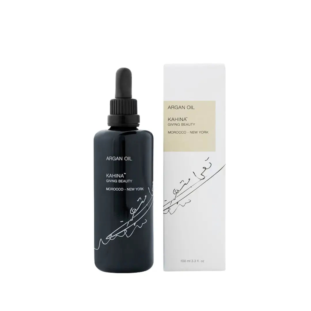 100ml Kahina Argan Oil in a black dropper bottle with its elegant packaging.