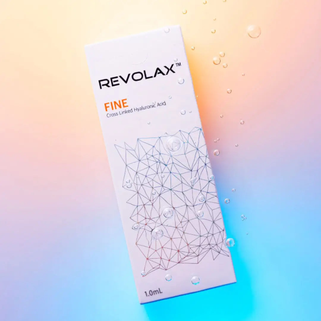 Revolax Fine packaging on a pastel background with water droplets, a dermal filler for superficial lines like crow's feet and neck wrinkles.
