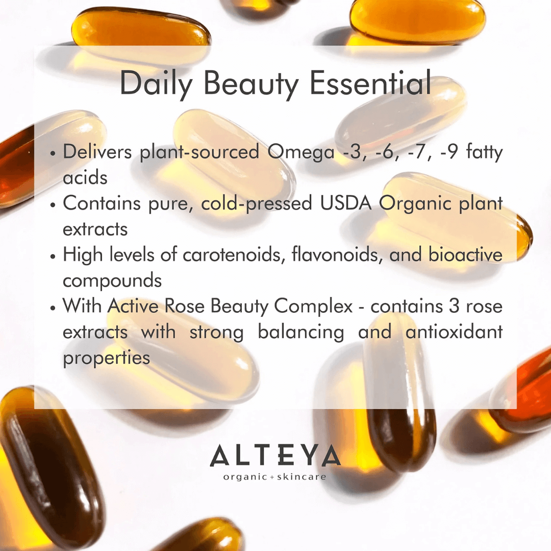 Daily Beauty Essential - Omega-rich, organic capsules by Alteya Organics spread out, highlighting ingredients for skin and hair health.