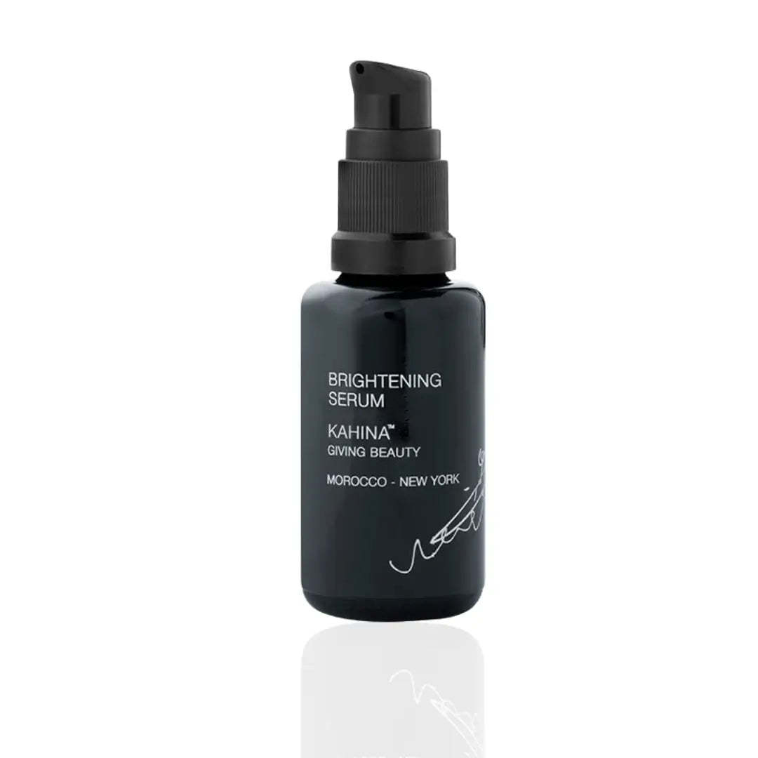 Kahina Brightening Serum in a sleek, black 30ml pump bottle, perfect for sensitive skin looking to enhance skin radiance and texture.