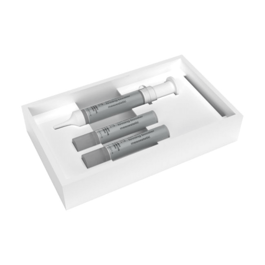 Mesoestetic Age Element Firming Booster pack with three 10ml bottles and an applicator in a white tray. Firming concentrate with lifting effect to reduce skin flaccidity and redefine facial contours.